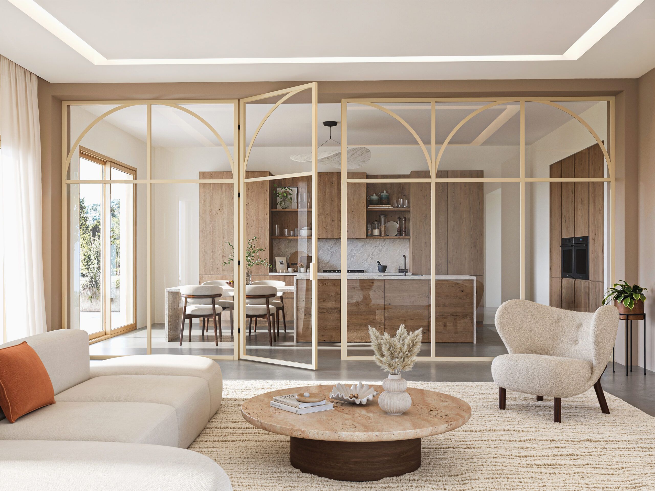 salon lumineux donnant vue sur une cuisine cloisonnée par une verrière toute hauteur vitrée avec système de porte battante permettant d'entrée dans la cuisine librement.